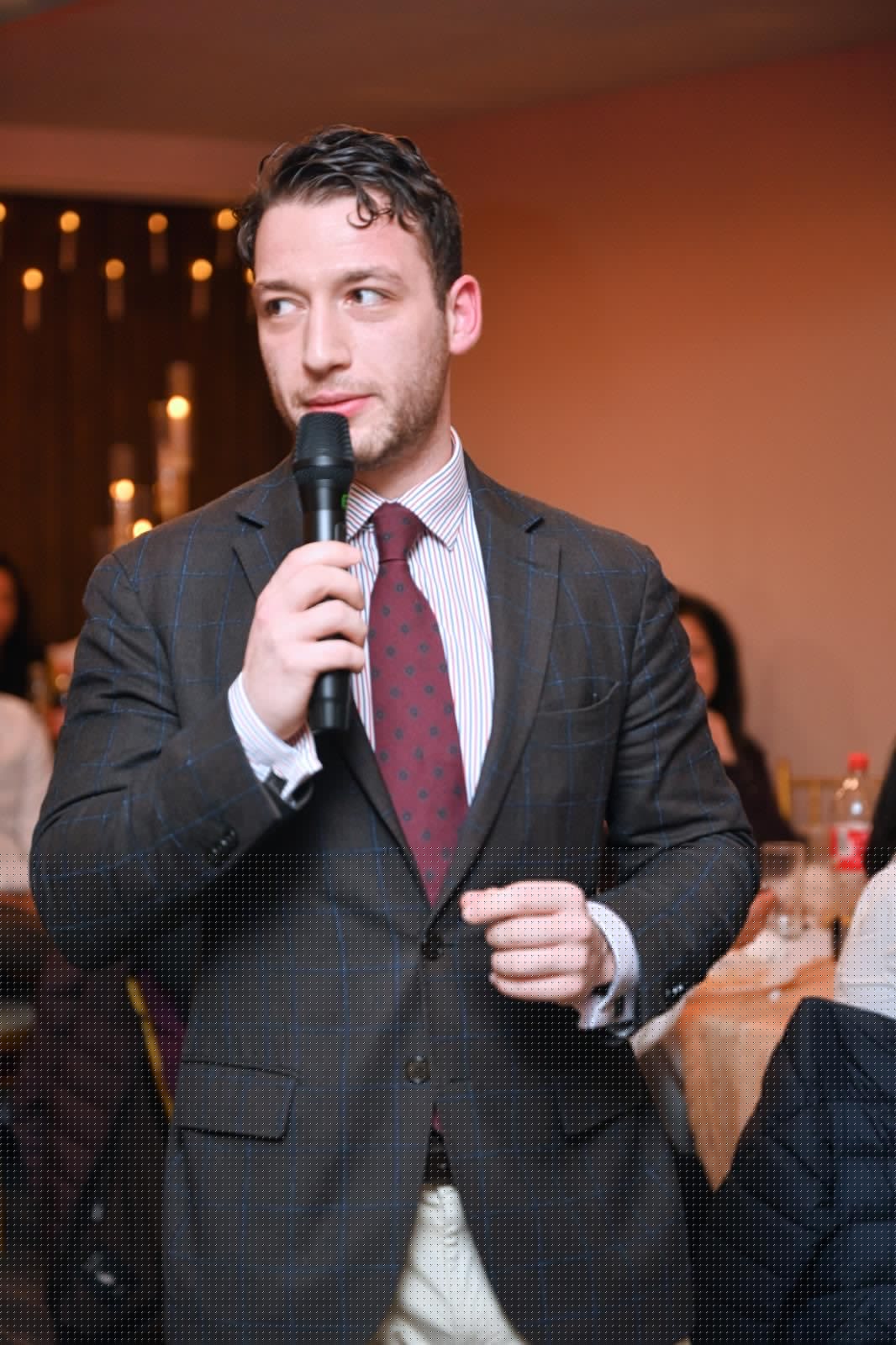 Kassim Beydoun performing with a microphone